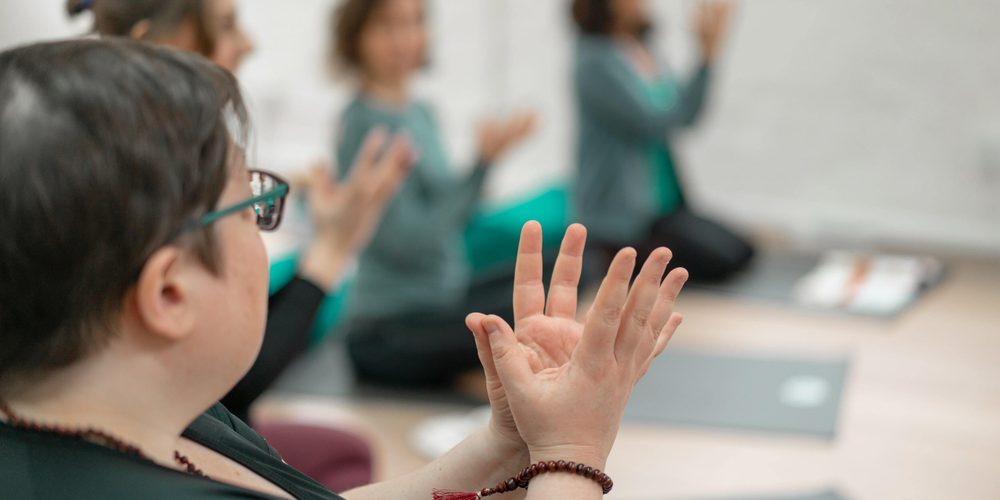 Generic - students doing lotus mudra