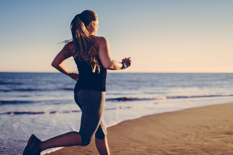 Running on the beach sand workout
